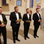 Koncert Slovenskega vokalnega kvarteta v cerkvi sv. Jošta